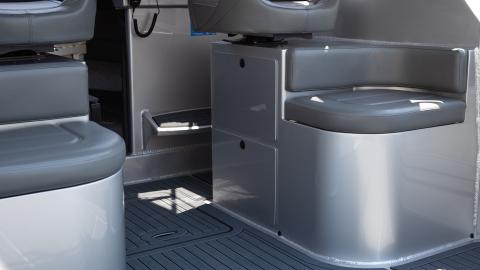 Built in curved seating with two drawers and top entry storage