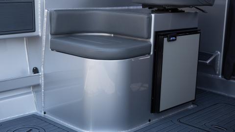 Built in curved seating with fridge and top entry storage