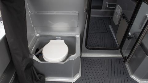 External module with electric flushing toilet under seat