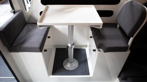 Wheelhouse drop down table seating with top entry storage