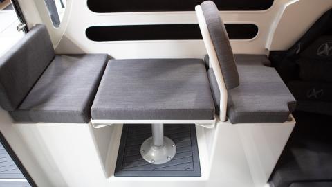 Wheelhouse drop down table seating with top entry storage