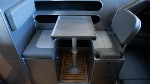 Enclosed wheelhouse drop down table seating with vynal upgrade with shower/toilet cubicle 